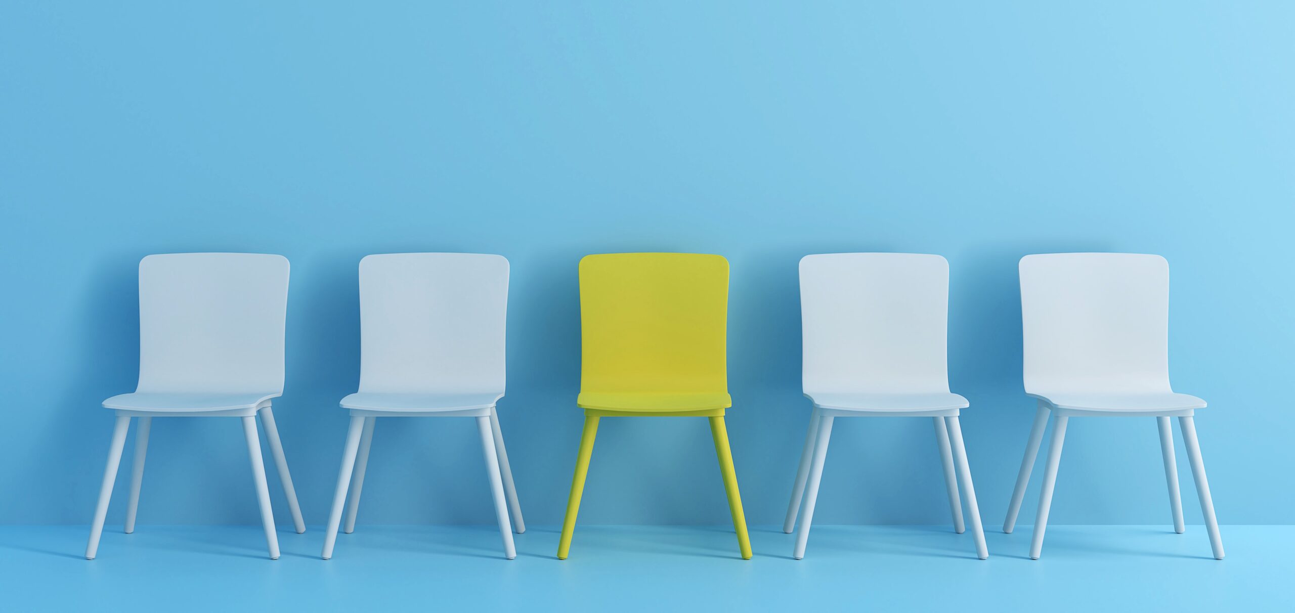 outstanding yellow chair among light blue chair. Chairs with one